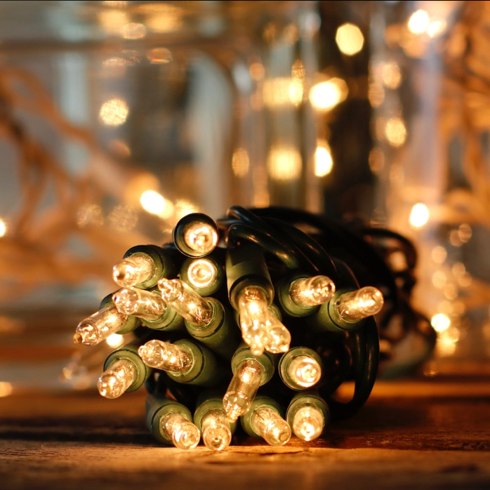 Chasing Christmas String Lights - (140) Clear Mini Lights - 4 in. Bulb Spacing - 49 ft.